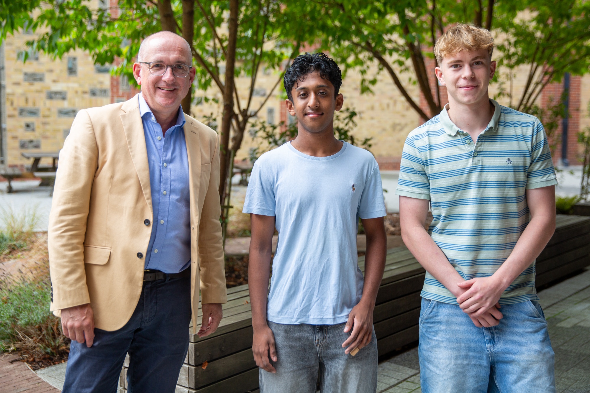Headmaster Joe Smith with St Benedict's students Krish S and Callum McG