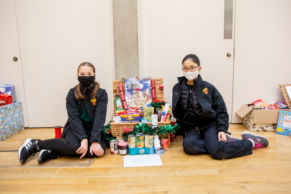 St Benedict's donates Christmas hampers to Ealing foodbank