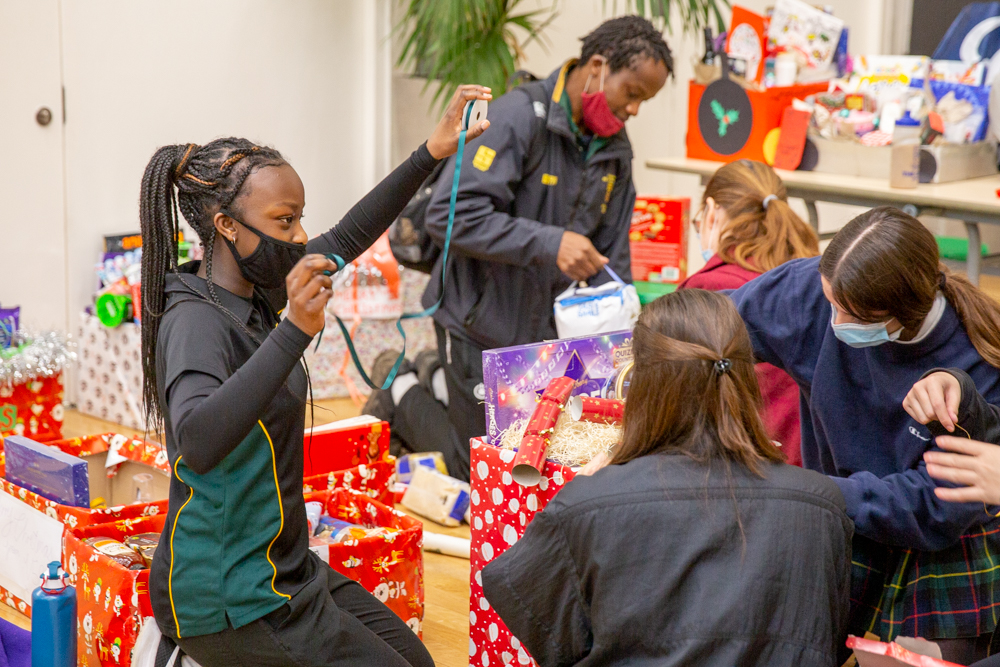 St Benedict's donates Christmas hampers to Ealing foodbank