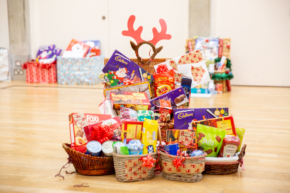 St Benedict's donates Christmas hampers to Ealing foodbank