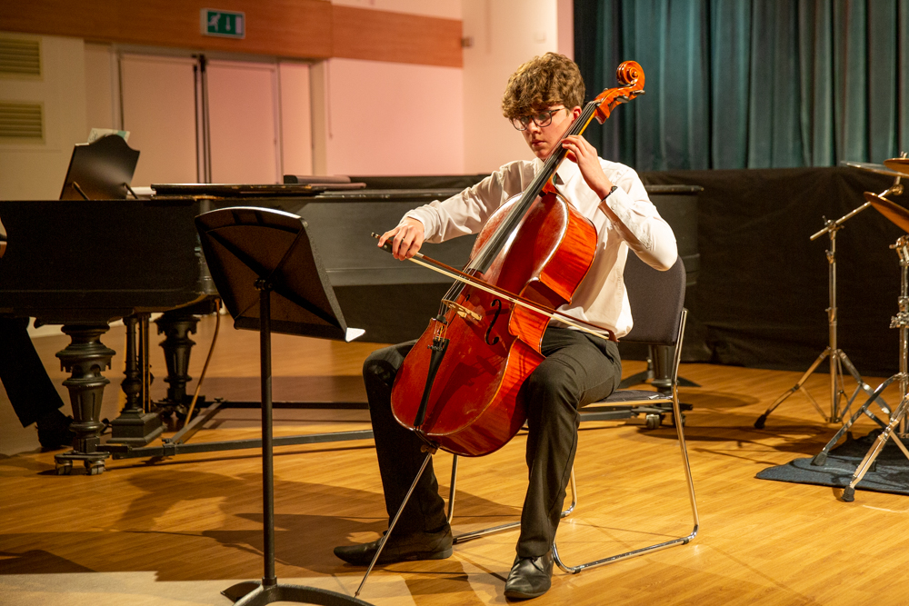 As ever, a range of extremely impressive performances, on piano, woodwind, strings, percussion, guitar and voice, presented the adjudicator with a formidable challenge in deciding the winners. Summing up the evening’s inspiring musicianship, Lucy Morris congratulated all performers and said: “You’ve been so brave and so brilliant, giving your best in front of an audience. What amazing talent in all three categories.” She then gave each performer valuable, encouraging feedback before announcing the winners. The annual Music Festival is a great opportunity for all our musicians to develop confidence and performance skills. In the preceding week the Heats adjudicator - Tomas Leakey, founder of the Mahler Players chamber orchestra, and Diploma Examiner for ABRSM - heard and gave feedback to over 240 solo entries from pupils in Year 7 to the Sixth Form.  In addition to the 21 excellent solo performances, the audience enjoyed wonderful ensemble performances before the competition and between each class. WINNERS Flohouse Cup                                             Rory Johnston (U4) Sonata for Saxophone   Victor Morosco  Senior Section Cup  Ned Watts (U5) Vocalise for Cello Op. 34 No. 14 Rachmaninoff    Intermediate Section Cup  George Majcherczyk-Olczak (U4)    Nuit d’etoiles     Debussy  Junior Section Cup  Jake Toynton (L4)  Allegro (1st Movement, Clarinet Quintet K. 581)  Mozart