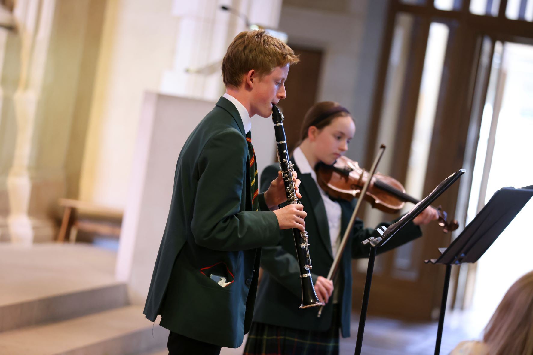 Prize Giving, a celebration of the many achievements of St Benedict’s pupils, was attended by parents, pupils, staff, governors, alumni and friends of the school. The evening began with a welcome from the Head Boy, Robert Jeffries, and Head Girl, Natalia McFadzean. The opening prayer was led by the Deputy Head Girl, Alice Jenkins, and Deputy Head Boy, Arhat Talwar. This was followed by a performance of Khachaturian’s Trio (3rd movement), played by Arthur Hair (piano), Rory Johnston (clarinet) and Helena Ramsden (violin).