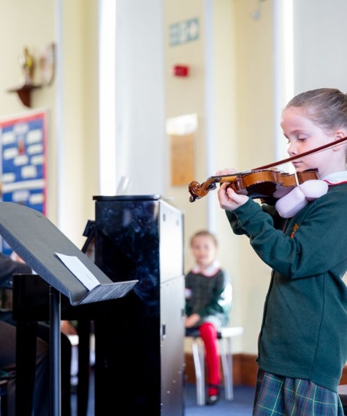 News » St Benedict's youngest musicians entertain